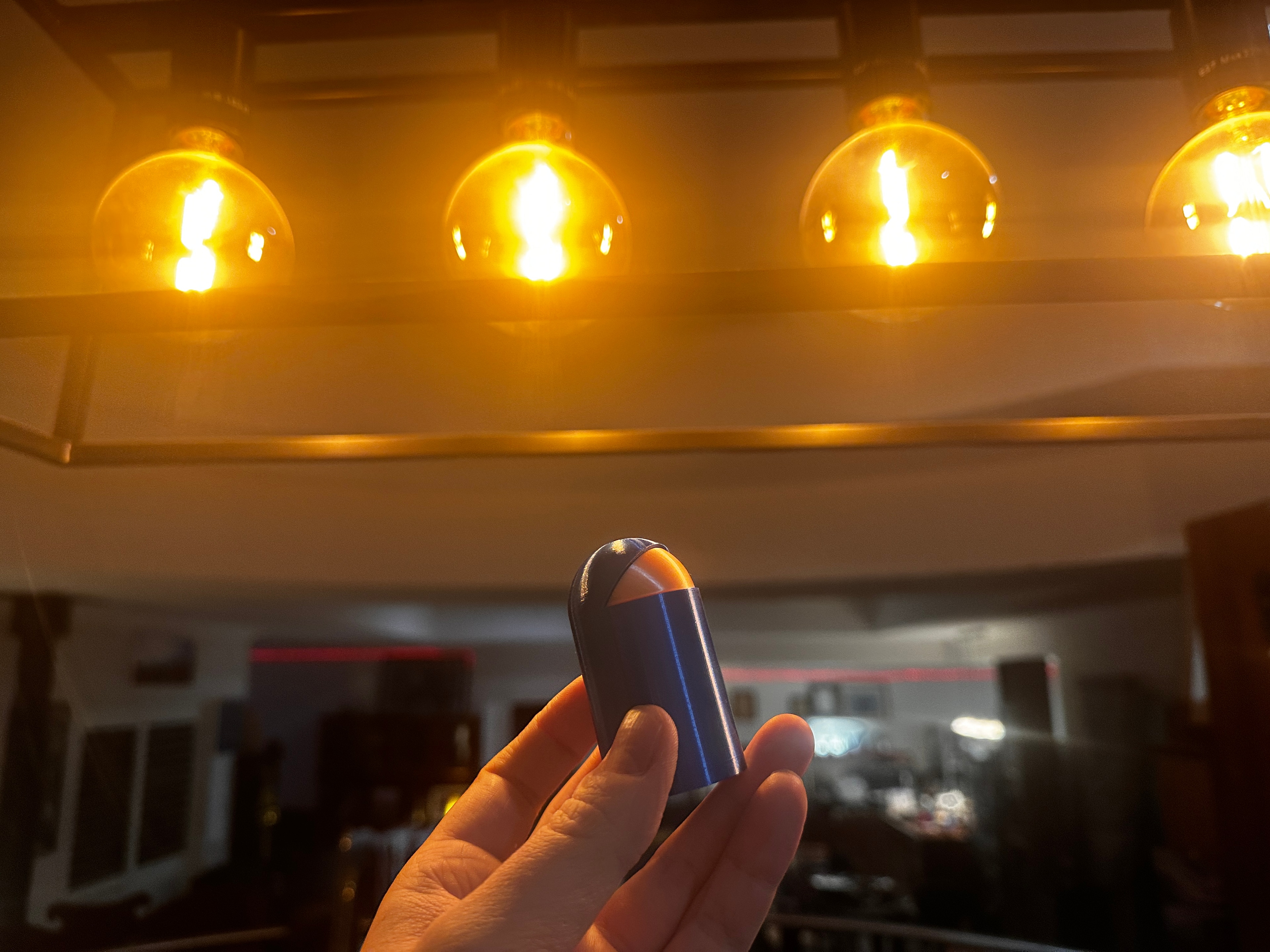 Holding a Starbuddy keychain in hand